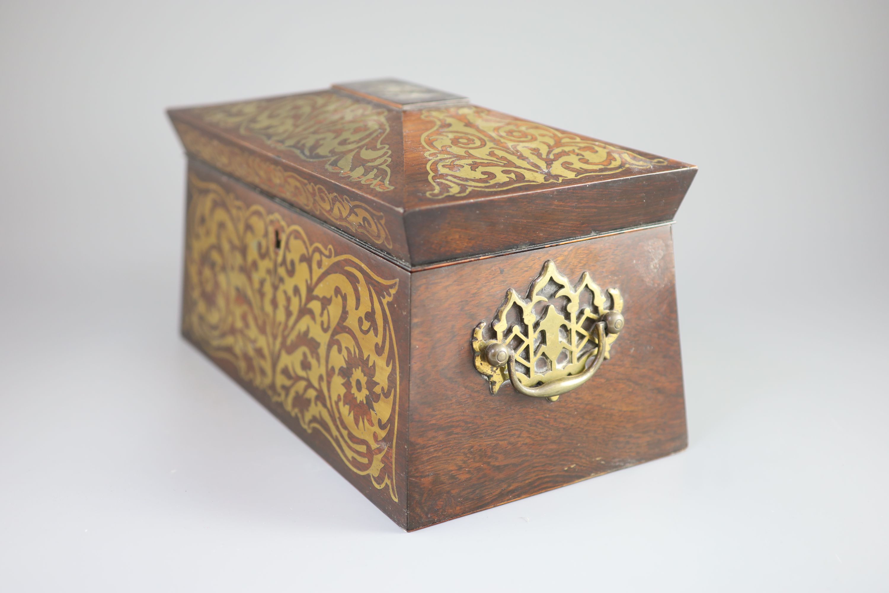An early 19th century brass inlaid rosewood tea caddy in the boulle manner, 33 x 18cm, 18cm high.